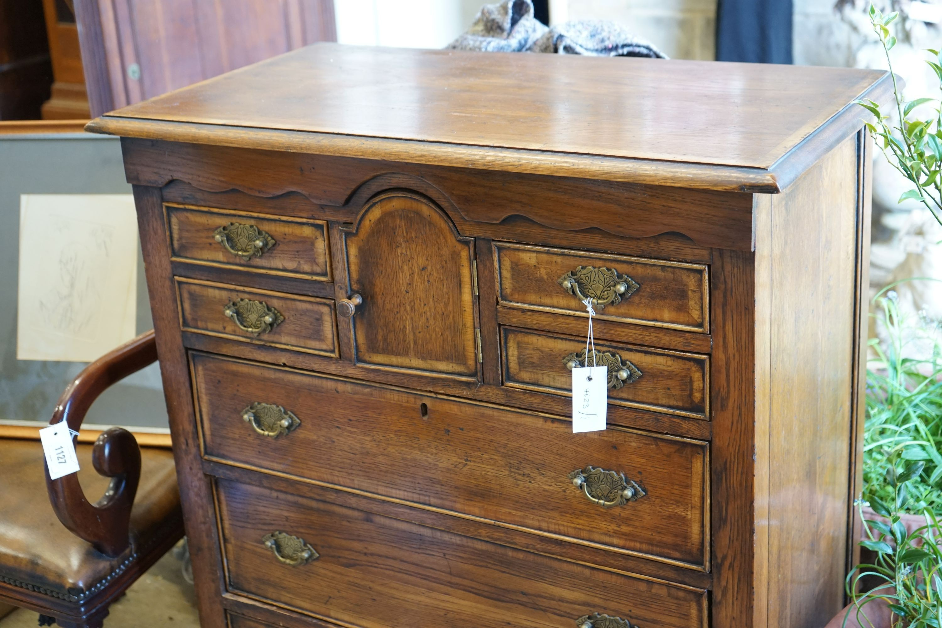 An 18th century style oak chest, width 83cm depth 46cm height 104cm